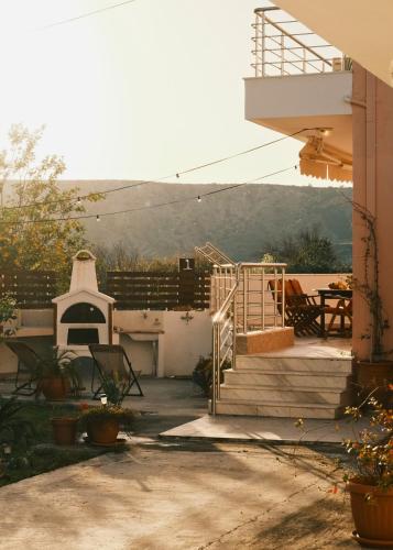 a view of a house with a porch and a patio at Villa Anastasia in Apolakkiá