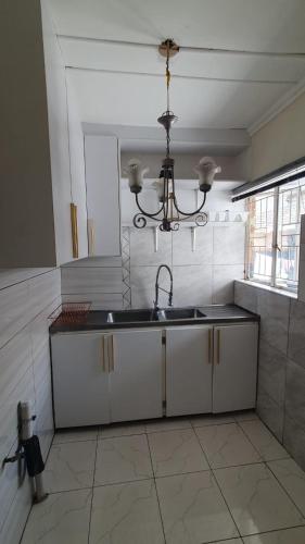 Η κουζίνα ή μικρή κουζίνα στο Makanaka Home