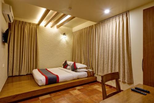 Cama o camas de una habitación en K Tree Boutique Hotel, Kolhapur