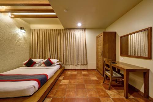 Cama o camas de una habitación en K Tree Boutique Hotel, Kolhapur