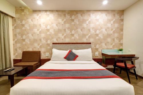 Cama o camas de una habitación en K Tree Boutique Hotel, Kolhapur