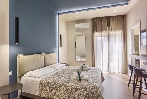 Postel nebo postele na pokoji v ubytování Tersikore bedrooms