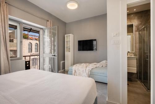 Ένα ή περισσότερα κρεβάτια σε δωμάτιο στο Baraca boutique