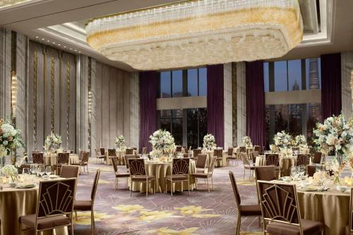 an image of a banquet hall with tables and chairs at The St. Regis on the Bund, Shanghai in Shanghai