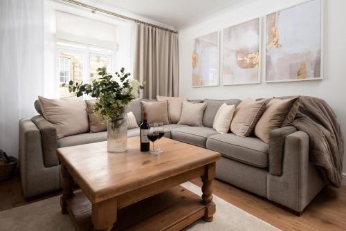 a living room with a couch and a coffee table at Beautiful Alnwick Apartment Two in Alnwick
