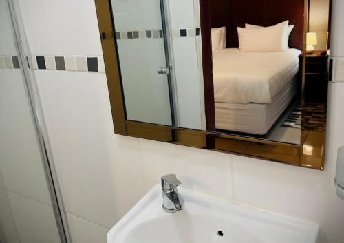 Ένα ή περισσότερα κρεβάτια σε δωμάτιο στο Khami Guesthouse