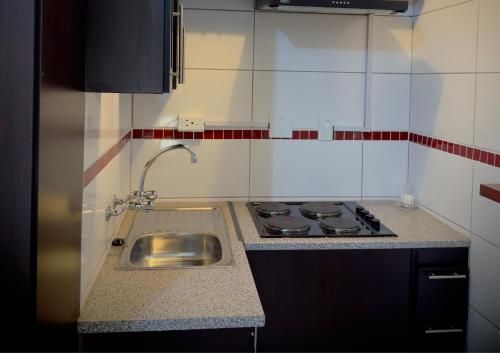 Η κουζίνα ή μικρή κουζίνα στο Khami Guesthouse
