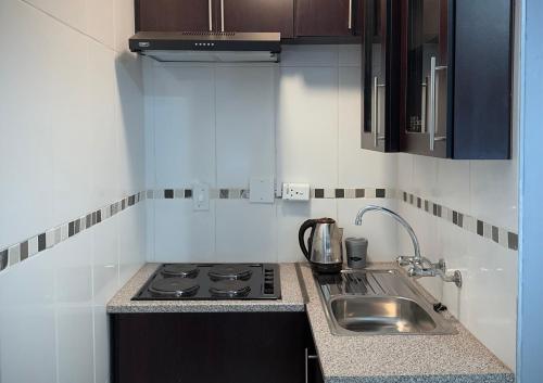 Η κουζίνα ή μικρή κουζίνα στο Khami Guesthouse