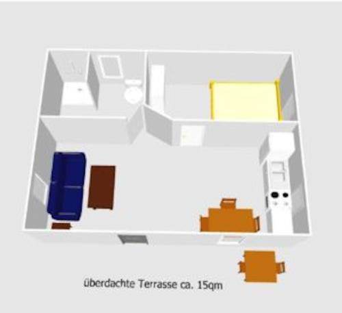 a drawing of a room with a blue chair at Bungalows Ostseequelle in Hohenkirchen
