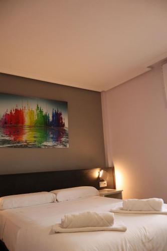 Postel nebo postele na pokoji v ubytování Hotel Tierra de Garnacha