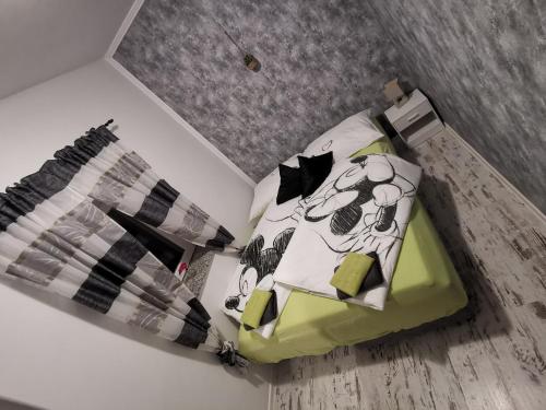 Кровать или кровати в номере Haus Cataleya