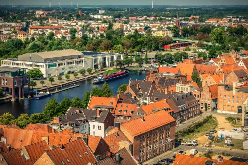 an aerial view of a city with buildings and a river at Altstadt Residenz in Lübeck