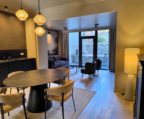 Χώρος καθιστικού στο Le 76 appartement 2 chambres avec jardin
