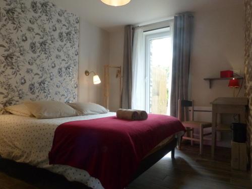 Posteľ alebo postele v izbe v ubytovaní Maison d'hôtes KerCalow, Chambres d'hôtes