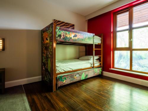 a room with a bunk bed in a room at Chessington Resort Hotel in Chessington