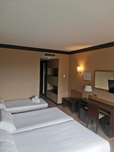 Letto o letti in una camera di Aparthotel Attica 21 Vallés