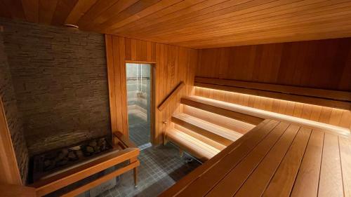 an inside view of a wooden sauna at Vinni Sport & Spa hostel in Vinni
