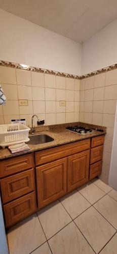 Una cocina o kitchenette en Unimar