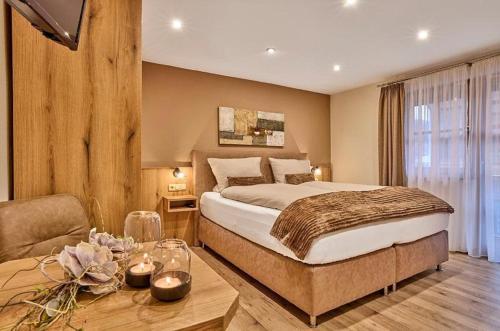 En eller flere senge i et værelse på Ferienwohnungen Kuchler