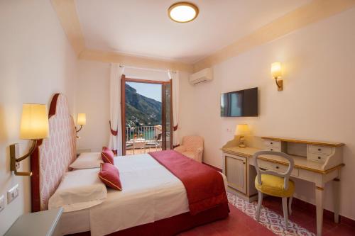 Postel nebo postele na pokoji v ubytování Hotel Casa Albertina