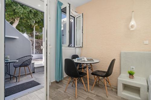 Coin salon dans l'établissement Oasis Suites Fira