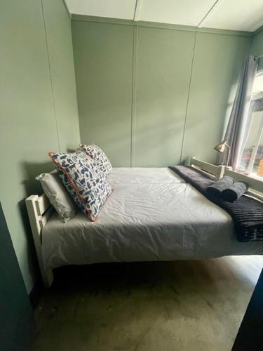 Katil atau katil-katil dalam bilik di Remhoogte Farmstay