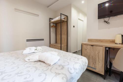 Letto o letti in una camera di Oneira Rooms