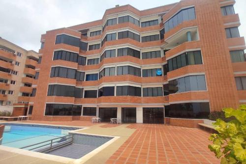 Der Swimmingpool an oder in der Nähe von Comodidad y relax en Apartamento cerca del mar en Chichiriviche