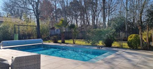 Photo de la galerie de l'établissement Belle villa avec piscine au cœur de Cestas, à Cestas