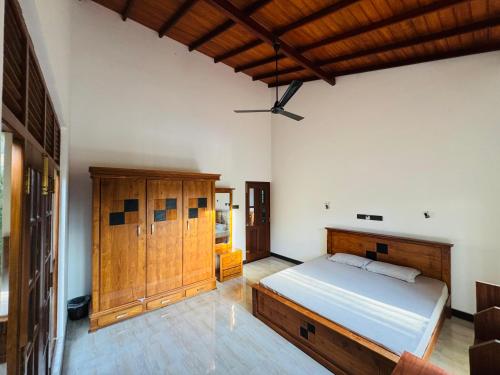 Ένα ή περισσότερα κρεβάτια σε δωμάτιο στο Villa J