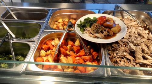 a plastic tray filled with different types of food at Comfortable and Spacious - Guest Room 7 in Cranleigh
