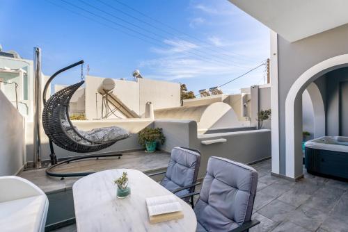 Coin salon dans l'établissement Oasis Suites Fira