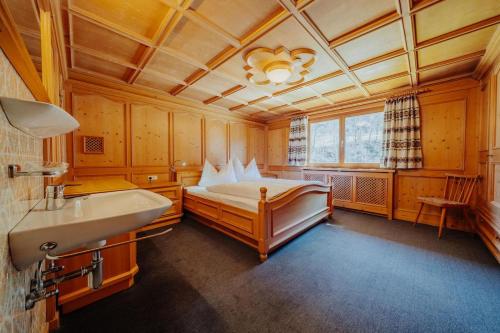 Una cama o camas en una habitación de Zudrellhus