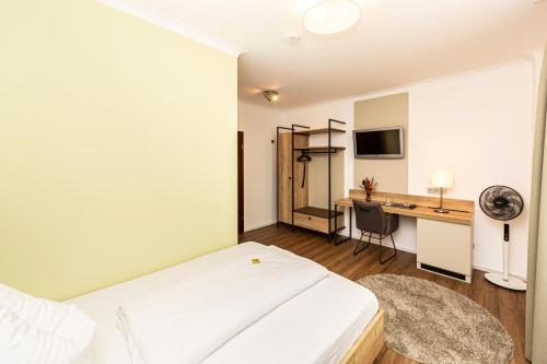 Η κουζίνα ή μικρή κουζίνα στο Königshof Bed and Breakfast