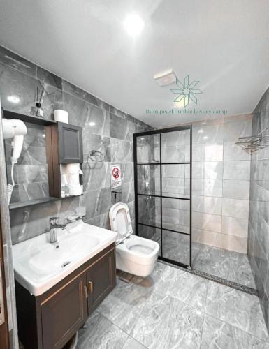 Koupelna v ubytování RUM PEARL BUBBLE lUXURY CAMP