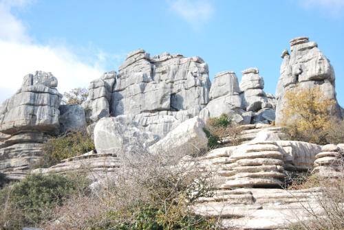 a rocky mountain with a blue sky in the background at Hostal R-Conecta in Cuevas de San Marcos