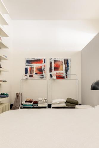 a room with white walls and white floors at Tuscany Crossroad in Empoli
