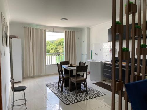 Χώρος καθιστικού στο Novo apartamento em São Lourenço