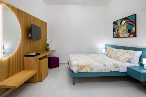 ADAMAS apartment , rooms and suiteにあるベッド