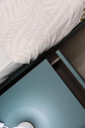 ADAMAS apartment , rooms and suiteにあるベッド