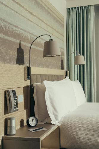 Ένα ή περισσότερα κρεβάτια σε δωμάτιο στο Park Terrace Hotel