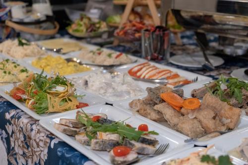 ゲストハウスの敷地内または近くでの食事または食べ物
