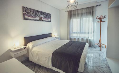 Posteľ alebo postele v izbe v ubytovaní Apartamento Picual Tranquilo y bien ubicado