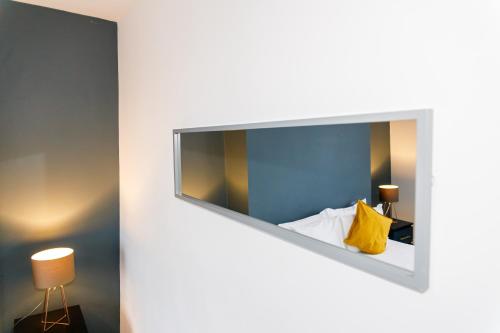 Ένα ή περισσότερα κρεβάτια σε δωμάτιο στο 3 Bedroom Home Free Parking & WiFi Contractors Welcome!