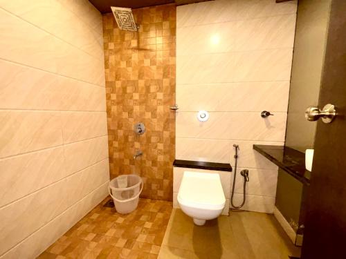 Ein Badezimmer in der Unterkunft Hotel Sai Residency