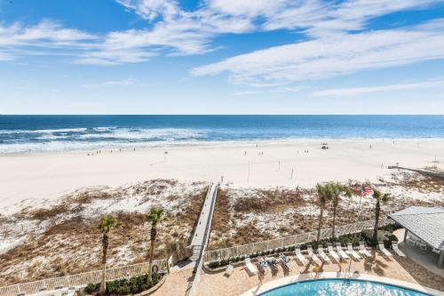 a view of the beach from the balcony of a resort at Windward Pointe 1401-Large balcony best views in Orange Beach