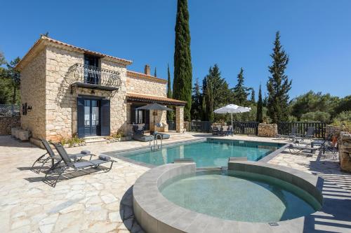 Πισίνα στο ή κοντά στο Villa Nephos