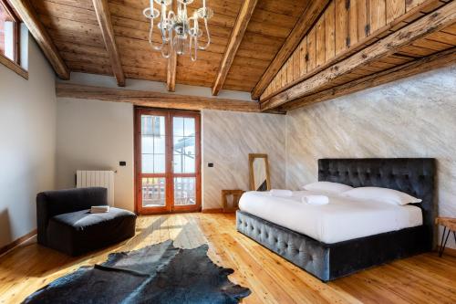 Ένα ή περισσότερα κρεβάτια σε δωμάτιο στο Hostdomus - Chalet Chic
