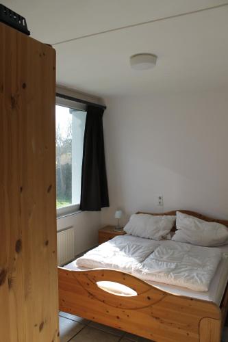 En eller flere senge i et værelse på Malou