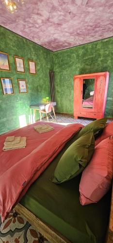Postel nebo postele na pokoji v ubytování Al Giardino Toscano